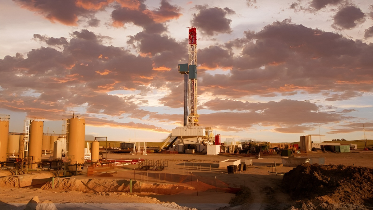 Oilfield water infrastructure and drilling site in the Permian Basin during sunset